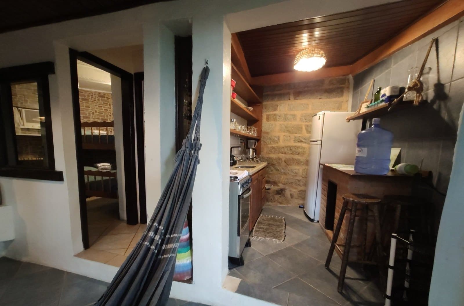 Casa 1 — Casa com cozinha completa, deck e churrasqueira — vista ao mar