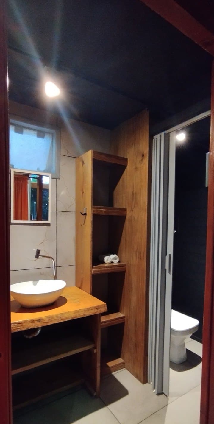 Casa 5 — Casa cercada de vegetação nativa, com vista para o Canto Sul